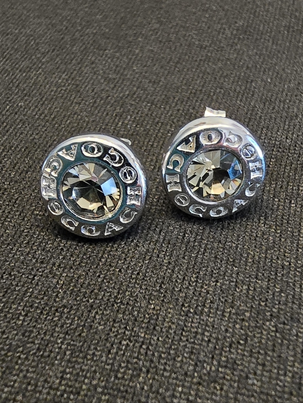 Coach Open Circle Stone Stud Earrings – Iconic Silver & Shimmering Grey